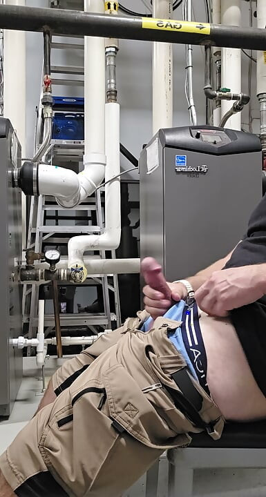 Hot coworker caught stroking his big fat cock