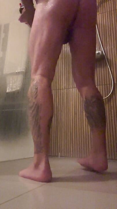 Horny showering with cumshot