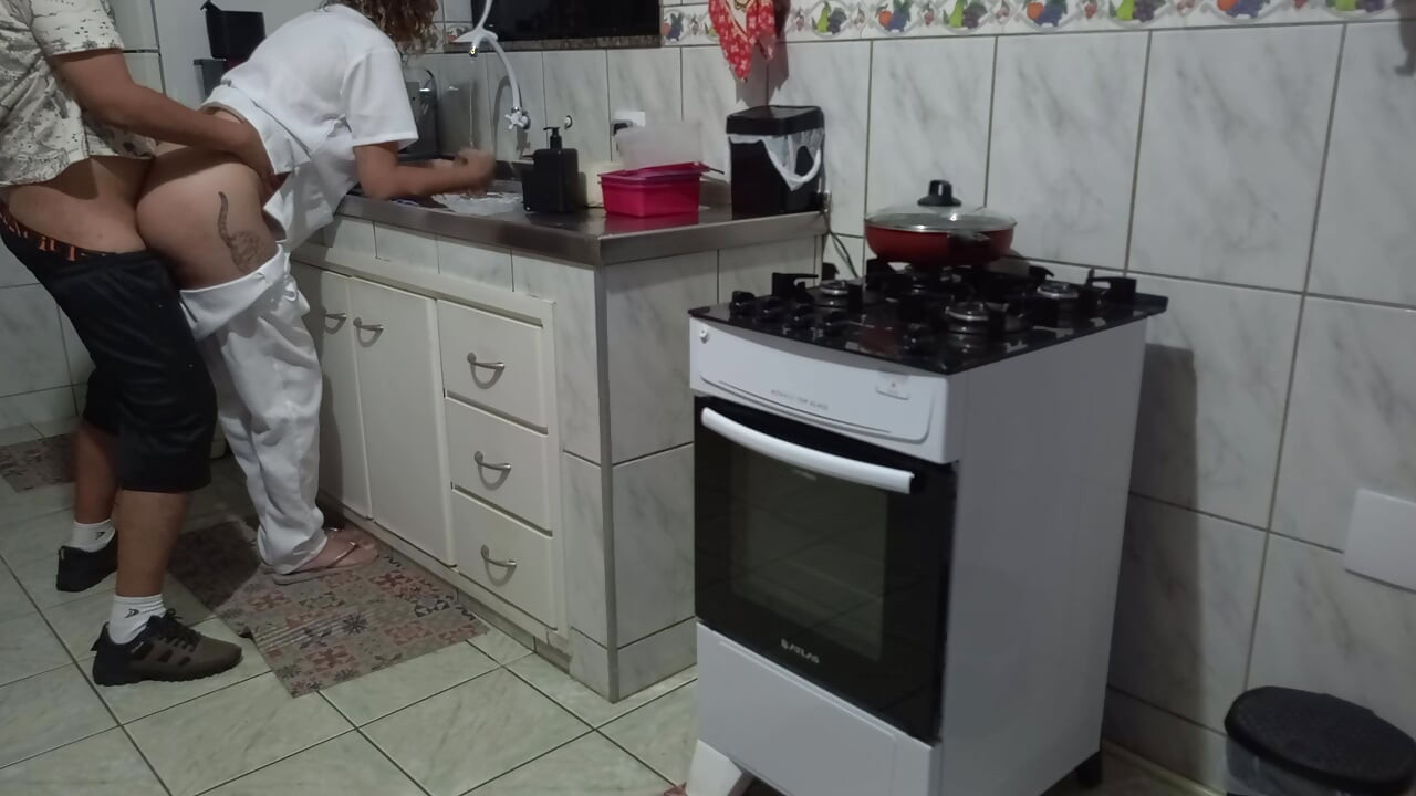 Maid had her ass used while washing dishes.