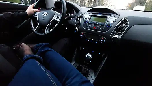 Amateur MILF in jeans and nylon socks gives a taxi driver a footjob