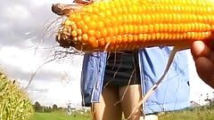 Stunning German lady stuffing a corn in her moist holes