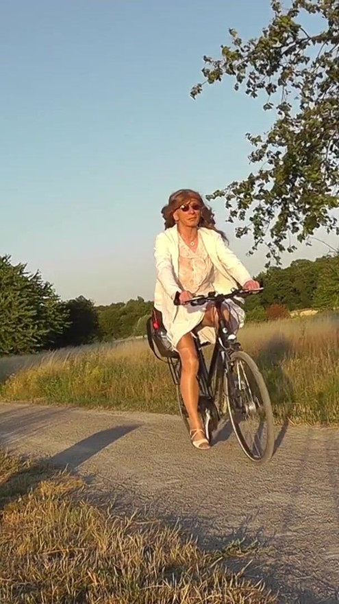 Daring Biking In Glossy Nylon Stockings | Clip 1