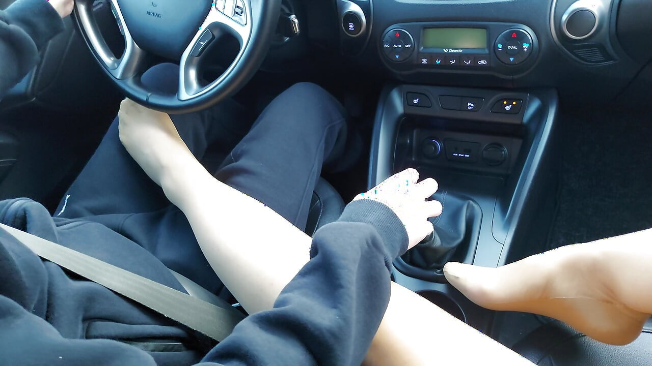 Mature stepmom teases her stepson in the car in public in the morning with her sexy legs in stockings