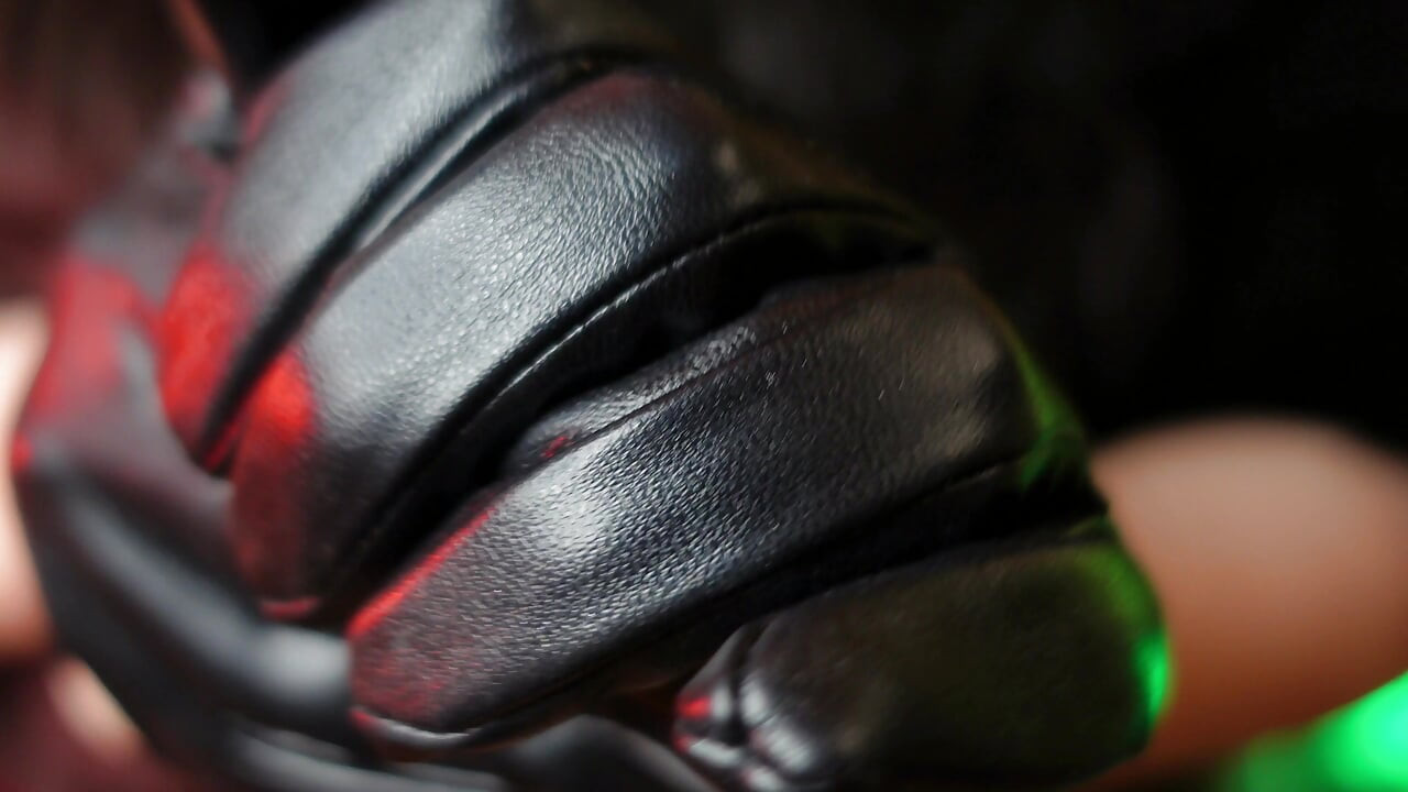 Sexy pin up Arya doing ASMR sounds with short leather gloves