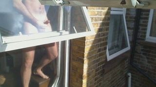 Window wank in the sunshine