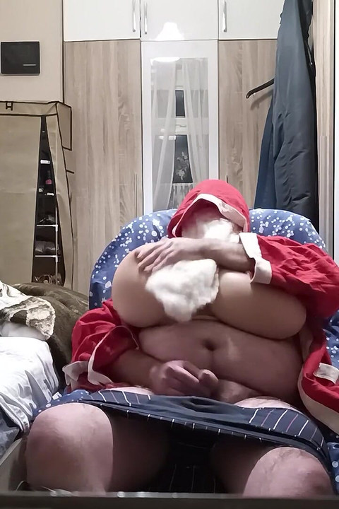 Santa Claus Masturbates with Huge Boobs