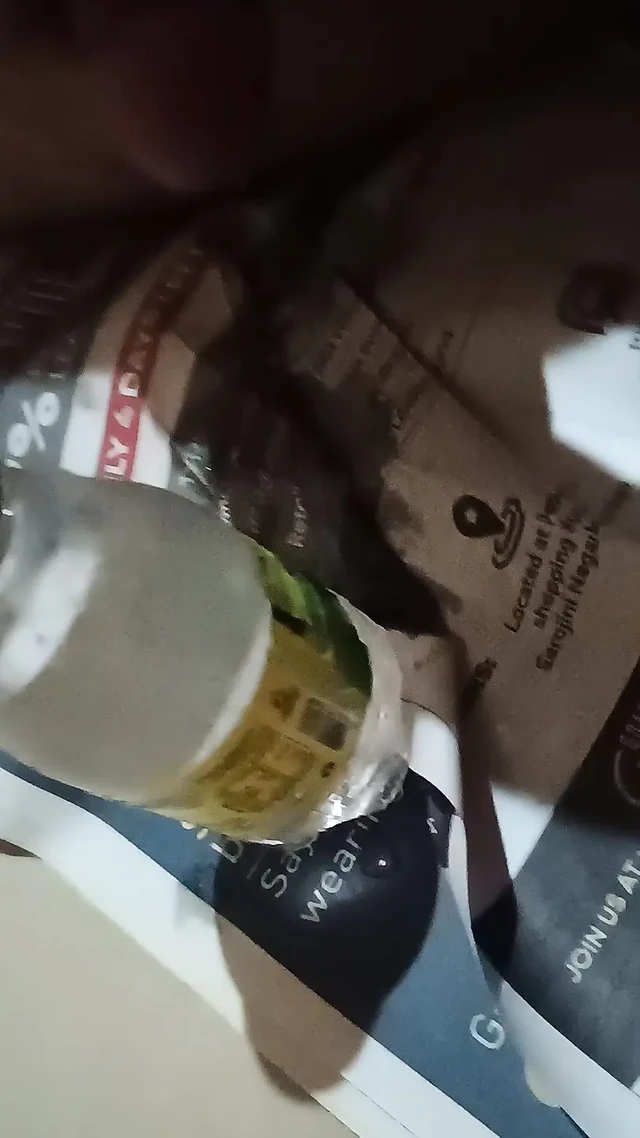 Put the bottle in the dirt and took out the water of the load.