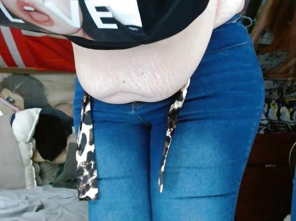 fat sissy with tits wearing and stripping out them tight jeans
