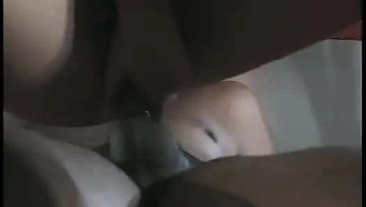 Brunette brazilian babe is on her knees sucking a cock