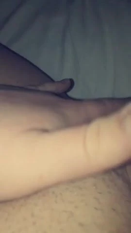 Cutie plays with her pussy