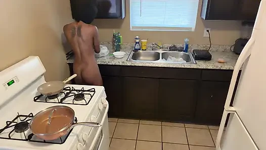 In the kitchen cooking and preparing food booty naked!