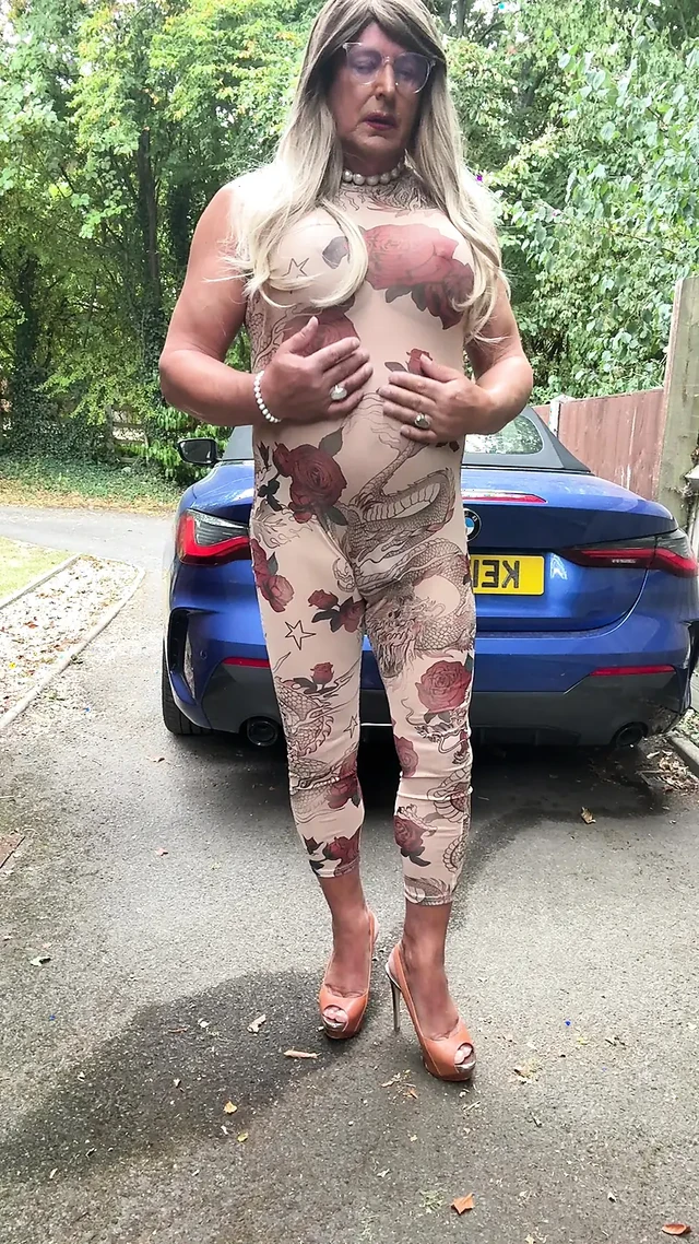 Sexy Crossdresser kellycd2022 in sexy floral see thru catsuit and heels