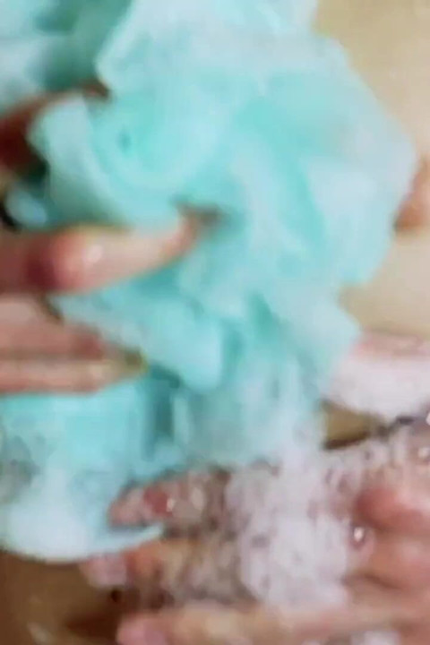 A Fitness Model Takes a Shower. Ass Close-up