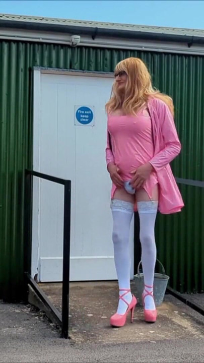 Emotional moment from "Tranny Gina In Pink PVC Dress Masturbating, Cumming"