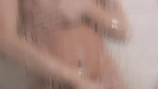 Small boobs brunette masturbating in the bathroom