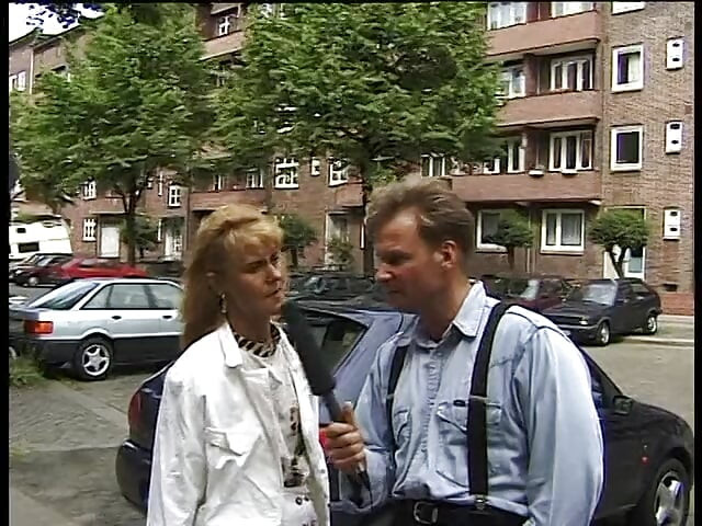 Blonde milf giving an interview