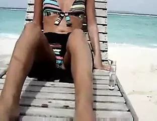 Sexy wife masturbating at the beach
