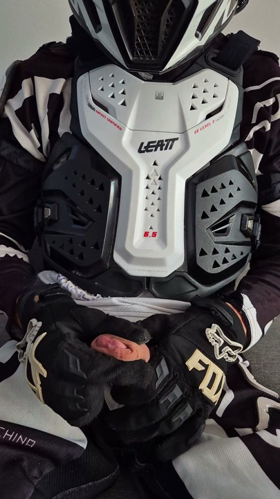 Motorcyclist in Gear Cum Hot on Himself
