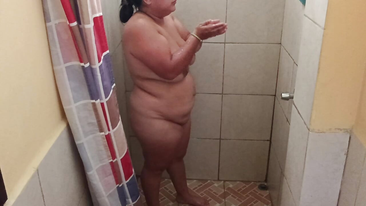 Taking a shower in a public restroom.