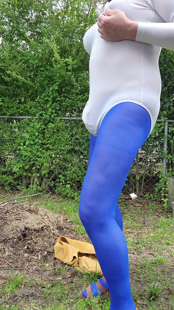 Key moment from "Gay Sexy Cd outdoors teasing and caressing myself in nylon tights, leotard, miniskirt."