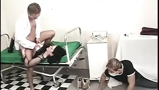 Three way ass fucking for brunette slut and two bisexual guys in exam room