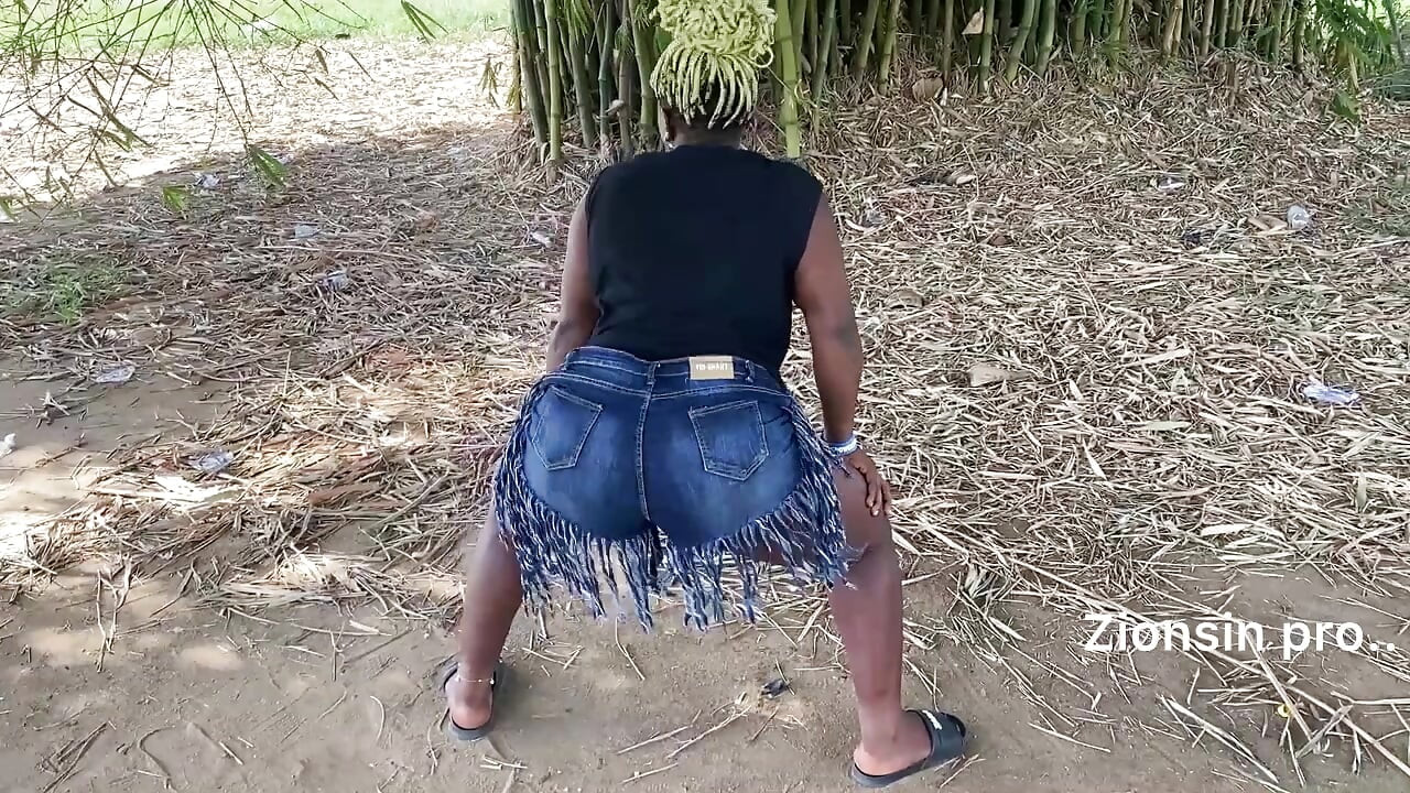Ebony sexy black girl dances in outdoor with much laughter