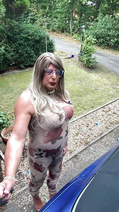 Sexy Crossdresser kellycd2022 in sexy floral see thru catsuit and heels
