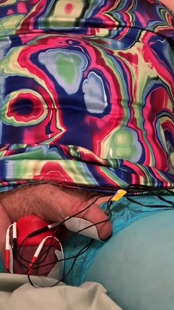 Key moment from "Pissing, then I oum 2 times.. Crossdresser twists his nipples, drips precum, pisses, estims and cums hands"