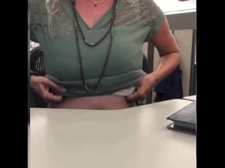 Sexy blonde having fun in the office