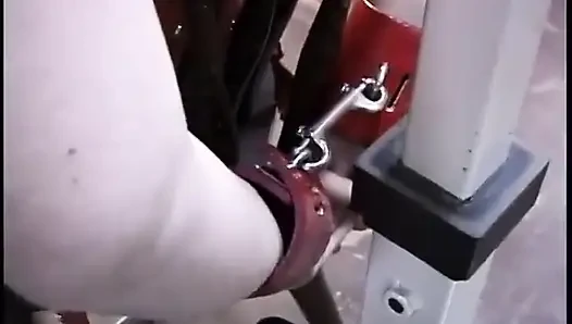 Her tits and hands are roped