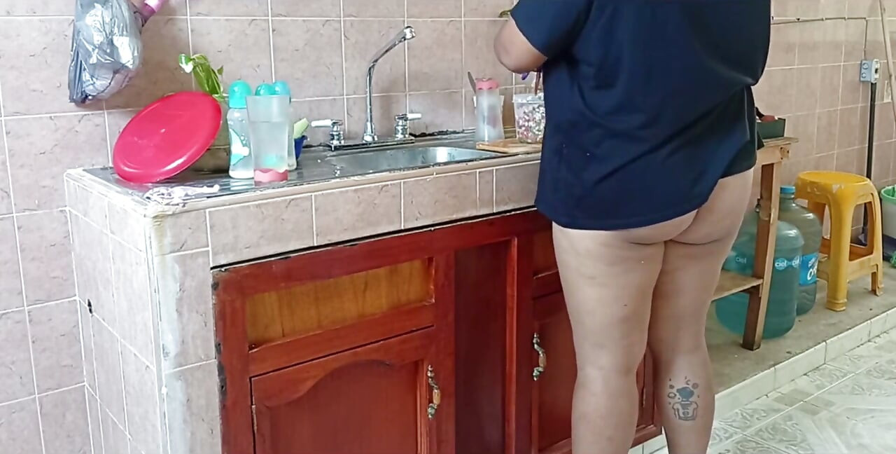 Chubby Stepmother Washes and Cleans the Kitchen