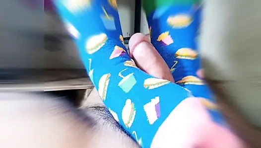 straw with feet wearing very funny stockings