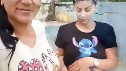 Lesbians milking in public