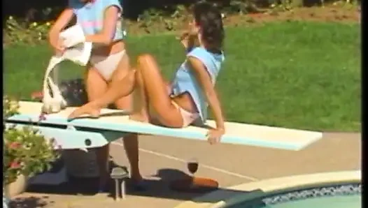 Sexy brunette babe rides her friend's huge strap-on with her tight twat