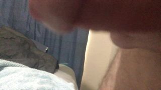Guy strokes cock and cums