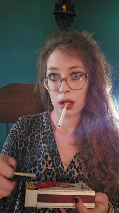 Cigarette Dangling while lighting a match