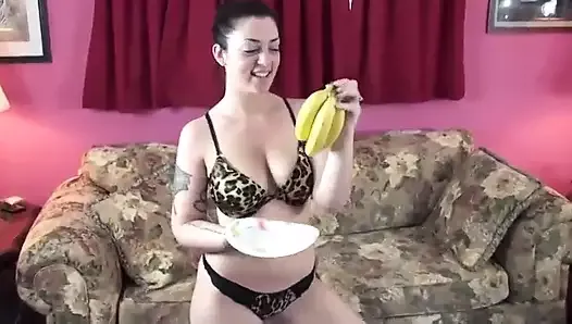 Hot dark haired teen strips off underwear then masturbates with banana