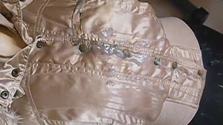 Guy ejeculating on second hand gold nylon jacket - Part 4