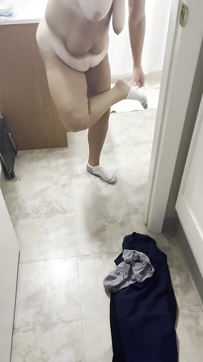 Undressing and peeing in the tub