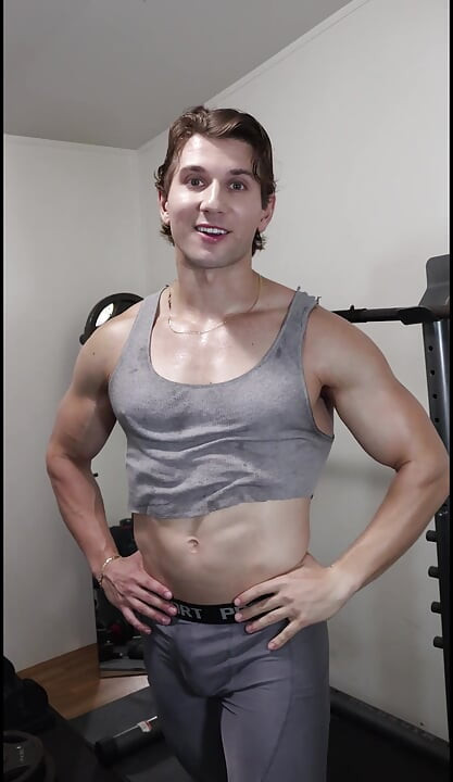 Adonis Beautiful Bodybuilder Boy Poses and Tries to Get You Workout