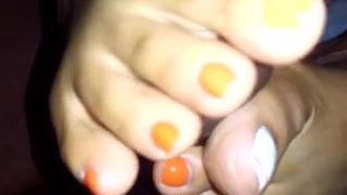 Oranje nagel footjob