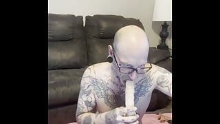 Tattooed Cuckold Sucks Dick