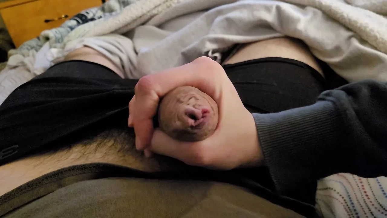 Teen teases cock through boxers for cumshot