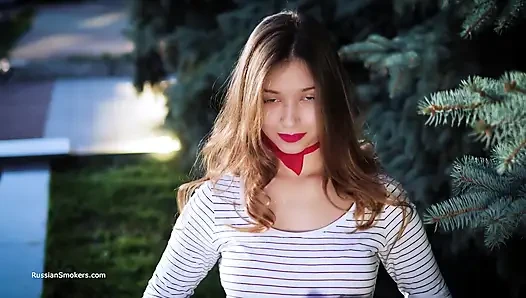 Sultry Russian Girl Smoking Cigarette by Waves