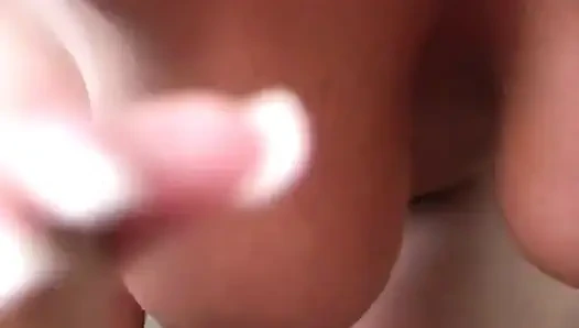 Big boobed slut gives a hot handjob