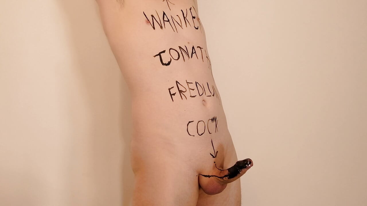 Jonathan writes cock, wanker and name on his shaved body and masturbates his uncut erect dick as he paints on himself