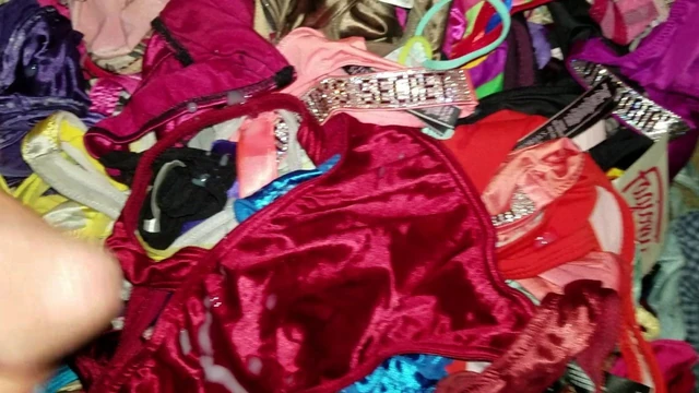 Cumming on a pile on satin thongs