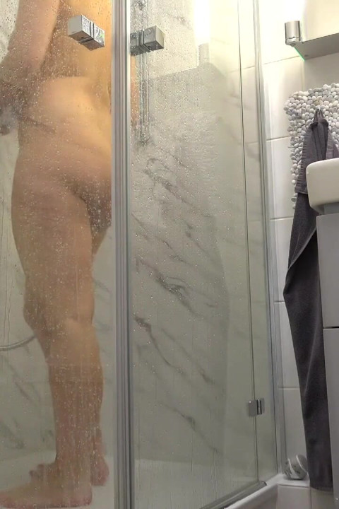 Secretary undressing and taking a shower