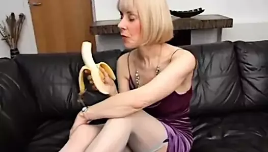 Hazel pleasures herself with a banana