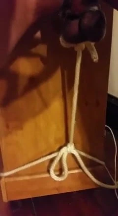 Testicle weight lifting